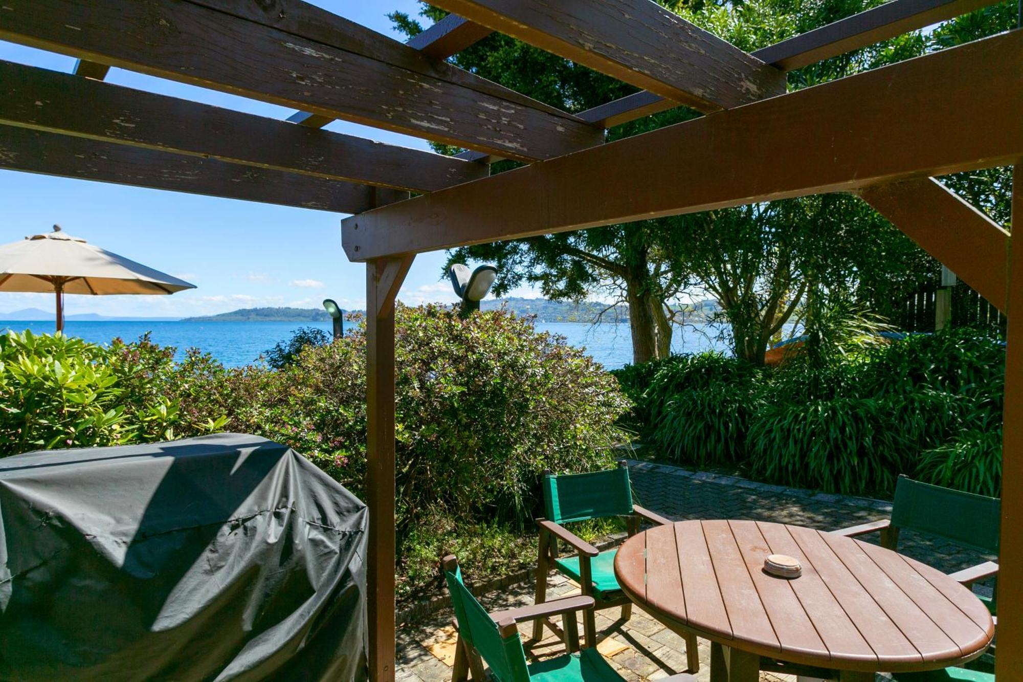 Cascades Lakefront Motel Taupo Exterior photo The view from the deck of the house
